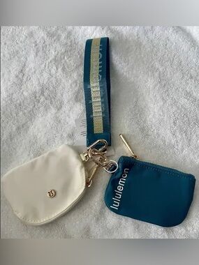 lululemon Teal and Cream Wristlet Duo with Gold Hardware